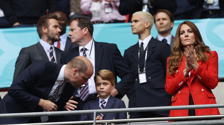 Prince George at sporting event with parents 