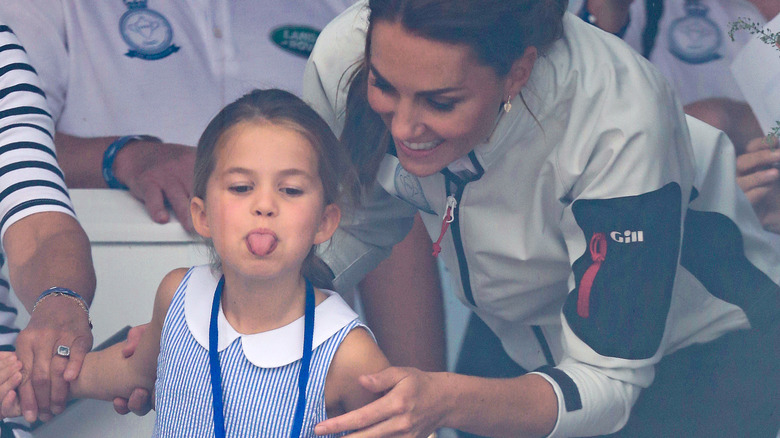 Princess Charlotte sticking out her tongue
