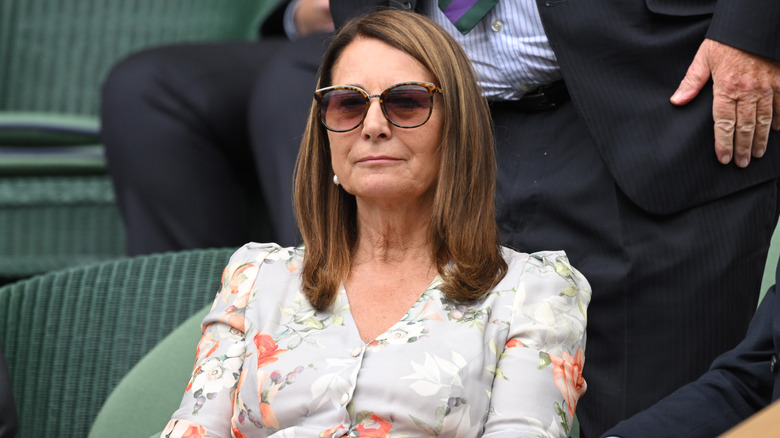 Carole Middleton sitting in bleachers