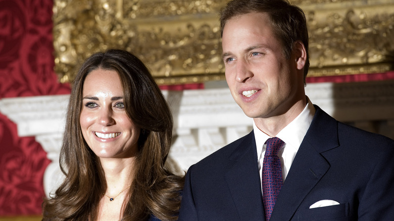 Prince William and Princess Catherine posing for engagement photos