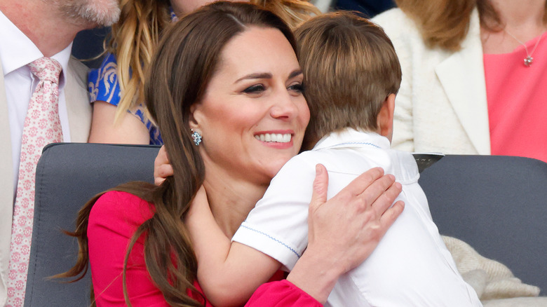 Princess Catherine, hugging Prince Louis 