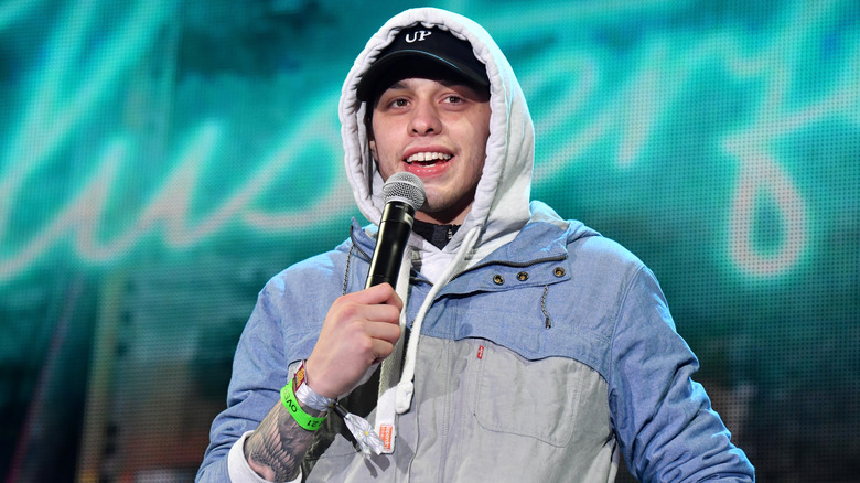 Pete Davidson speaking onstage