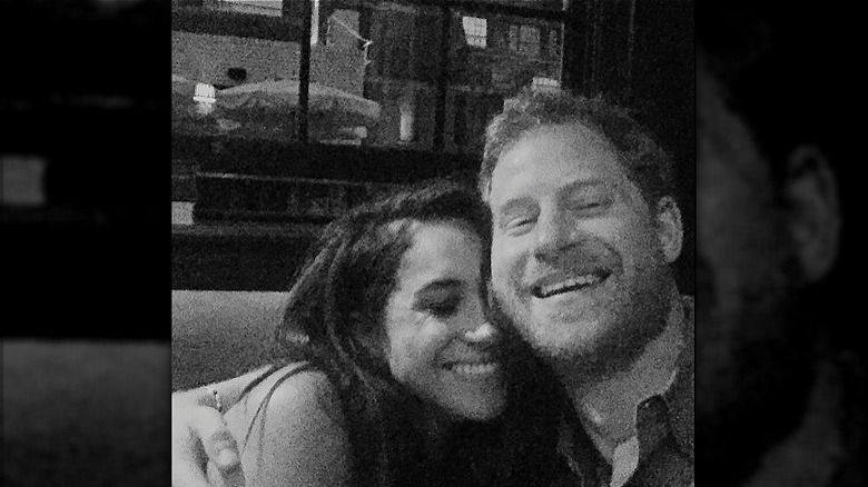 Harry and Meghan smiling on their second date