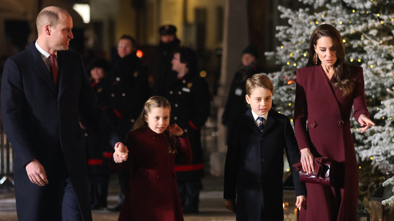 Prince William and Kate Middleton walking with kids