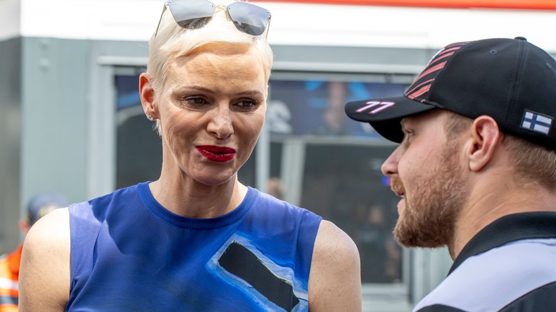 Princess Charlene smiling at driver