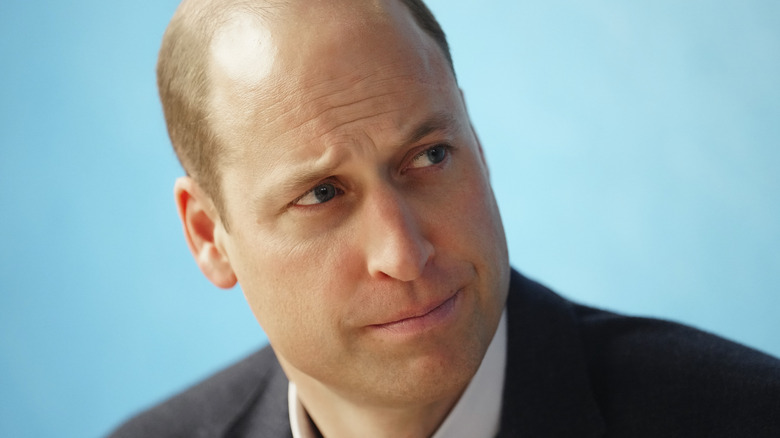 Prince William looks stern