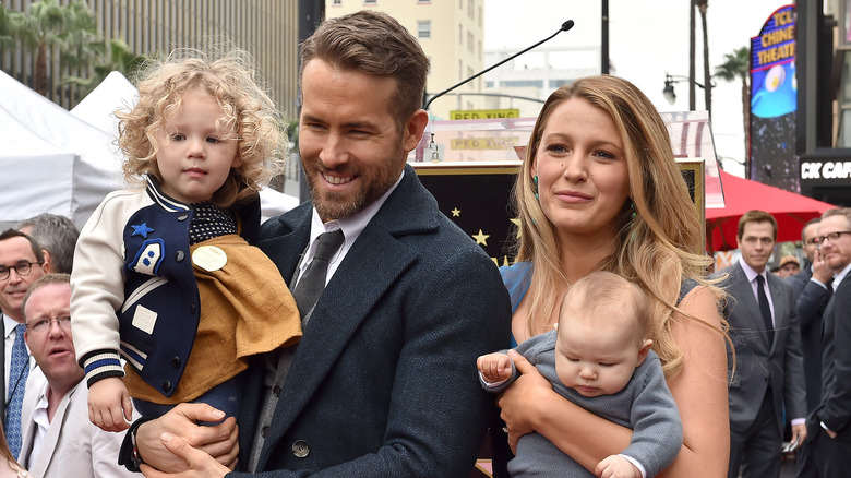 Ryan Reynolds posing with his family