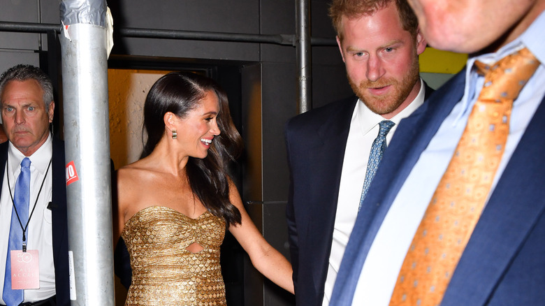 Meghan Markle and Prince Harry leaving an event