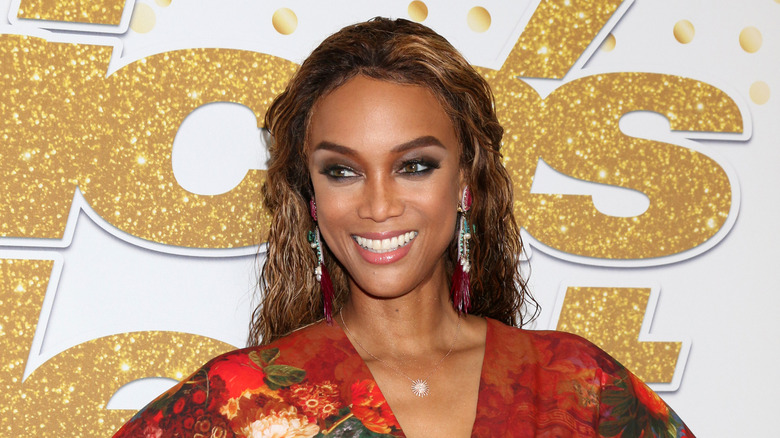 Tyra Banks posing, smiling 