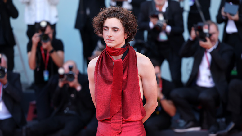 Timothée Chalamet in red backless jumpsuit