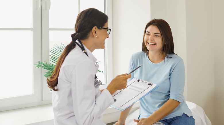 Woman consulting with a doctor