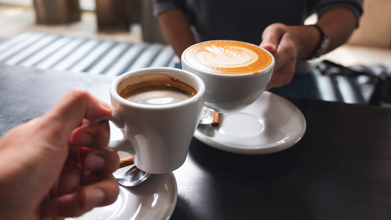 People drinking coffee in cafe