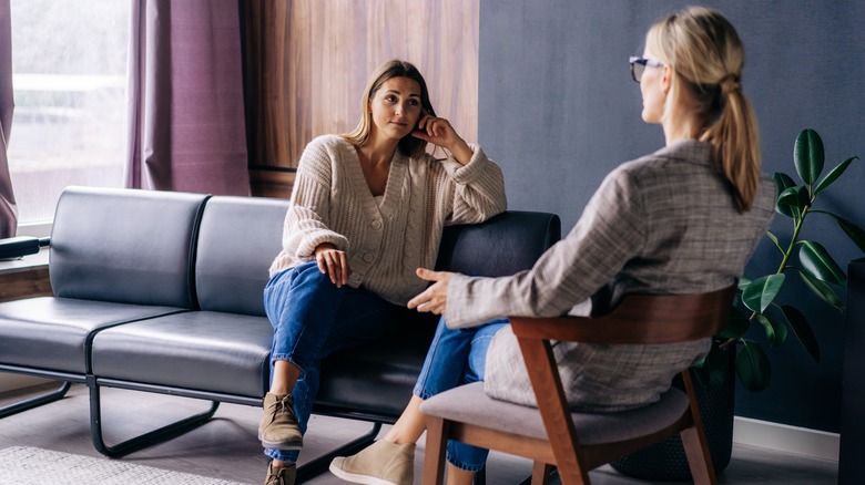 woman talking to therapist