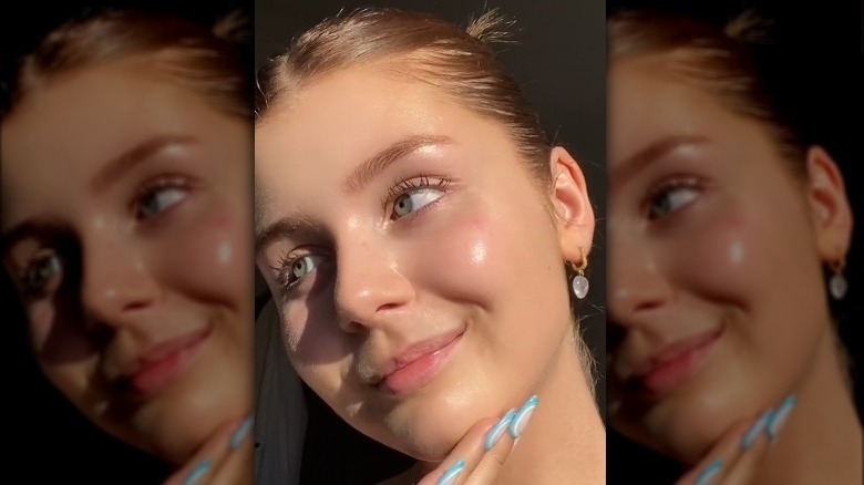 A woman with glowing skin