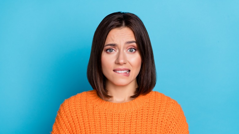 Woman looking anxious