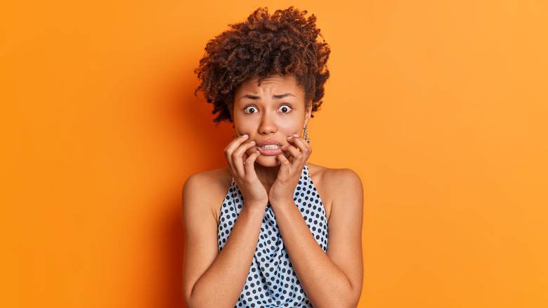 Unhappy woman with short hair