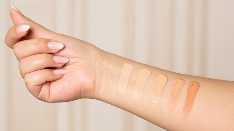 Different colors of makeup on an arm as a test