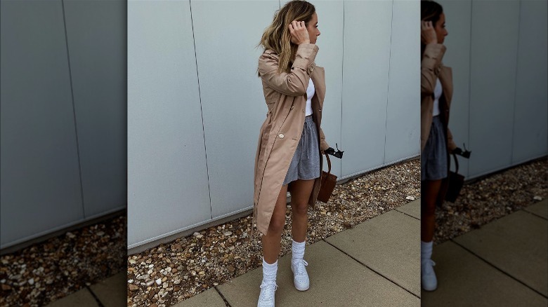 Trench coat and sweatshorts styling