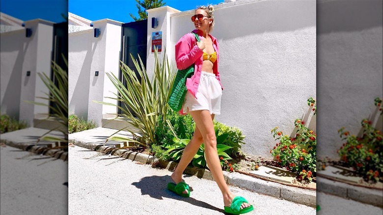 Woman wearing colorful sweatshorts outfit