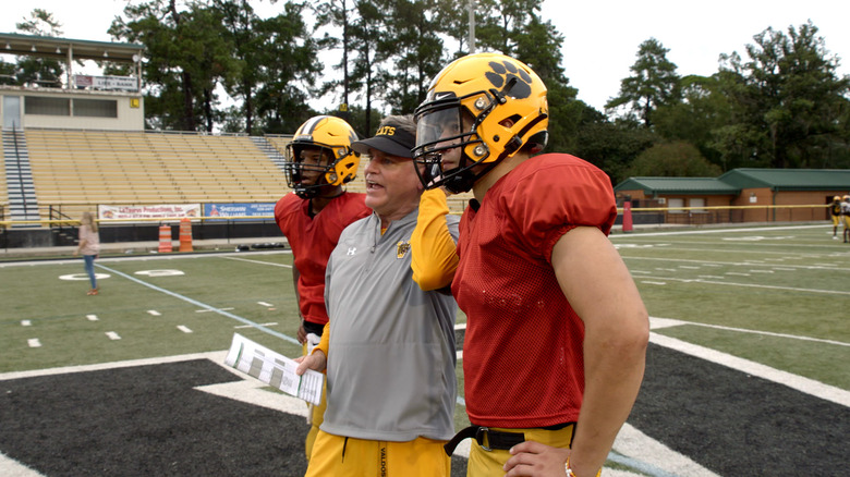 Titletown High players and coach