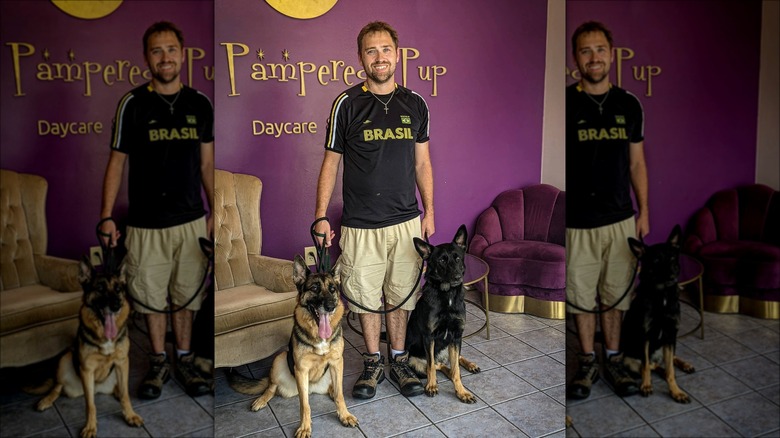 Paul Staehle posing with dogs