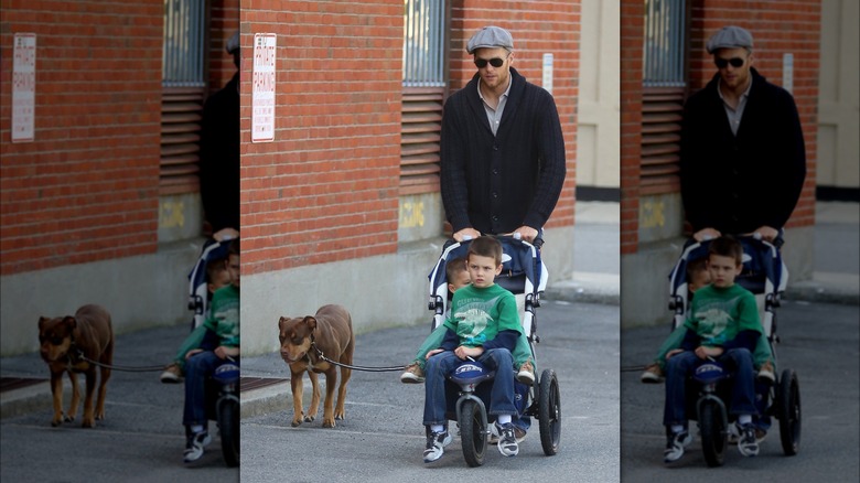 Tom Brady wheels his sons Jack and Benjamin in a stroller