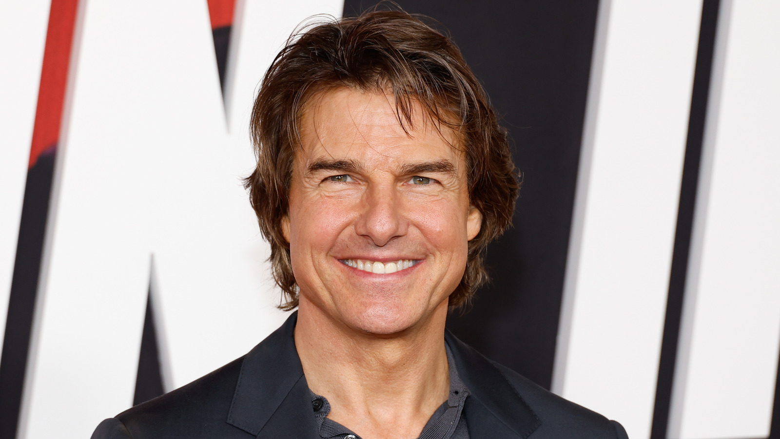 Tom Cruise Reportedly Skipped The 2023 Oscars To Avoid Seeing His Ex