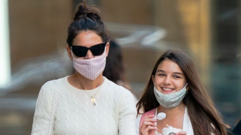 Katie Holmes and Suri Cruise eating ice cream