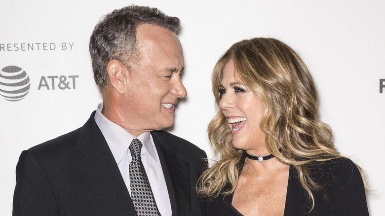 Tom Hanks and Rita Wilson laughing.