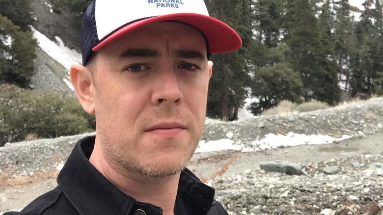 Colin Hanks outdoors hiking