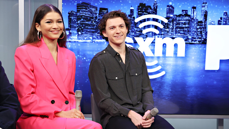 Tom Holland and Zendaya sitting for interview