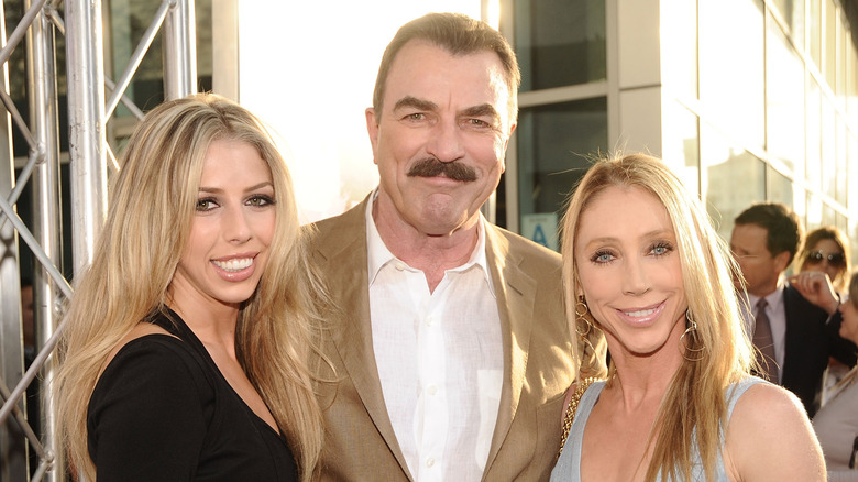 Hannah Selleck, Tom Selleck, and Jillie Mack smiling