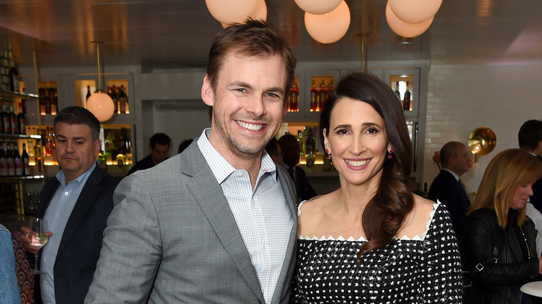 Tommy Dewey and Michaela Watkins 