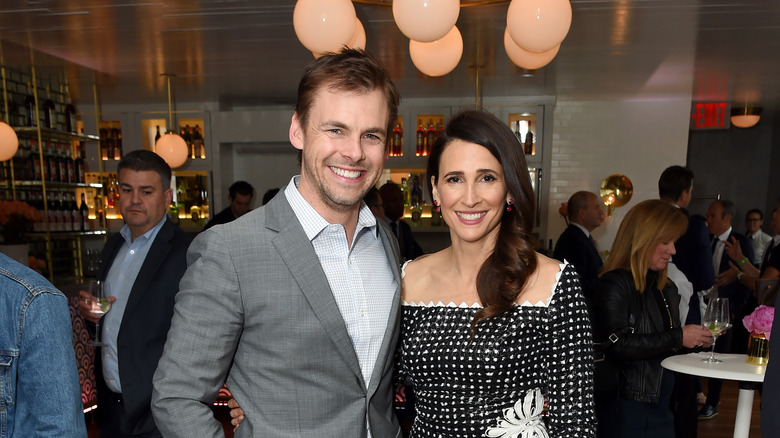 Tommy Dewey and Michaela Watkins