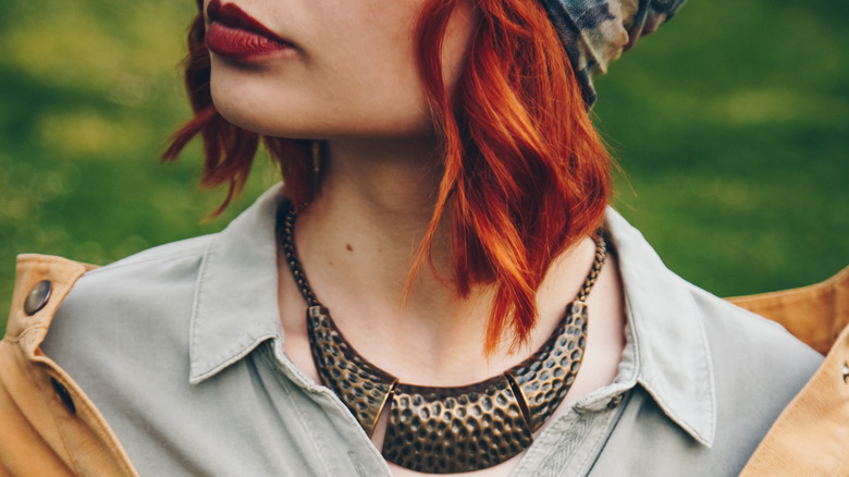 Woman with chunky boho necklace