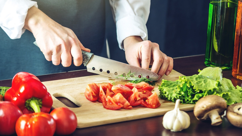 Chef cutting vegetables