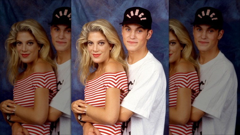 Tori Spelling and Brian Austin Green posing in '90s