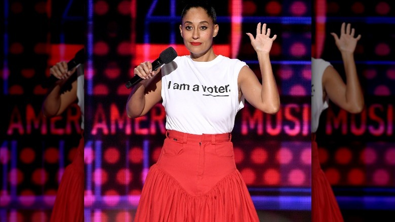 Tracee Ellis Ross waving