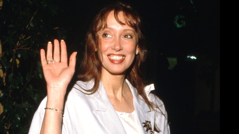 Shelley Duvall waving