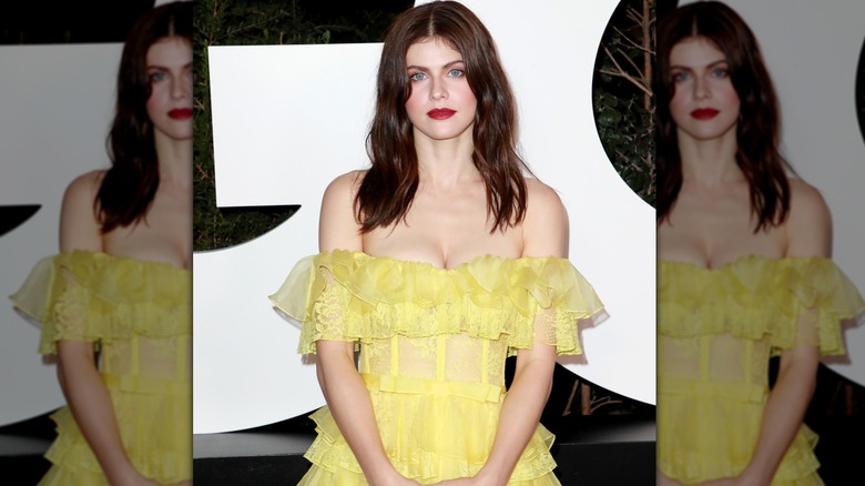 Alexandra Daddario wearing yellow dress