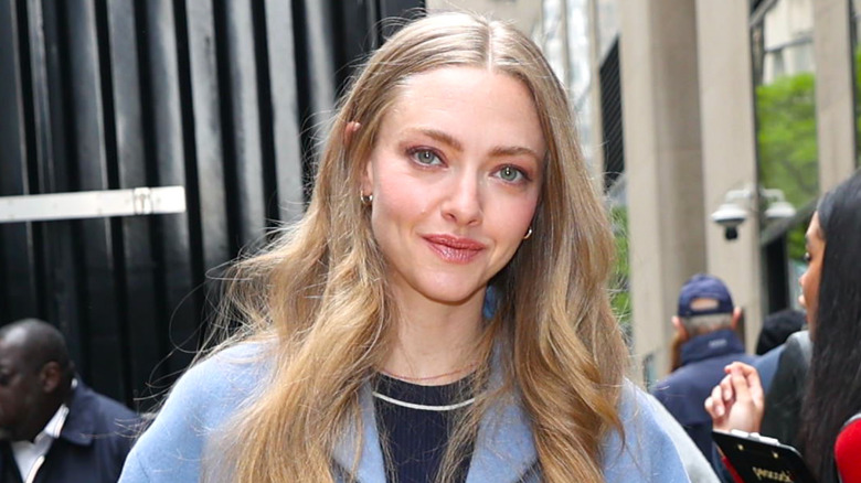 Amanda Seyfried wearing a blue coat