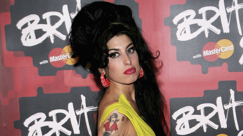 Amy Winehouse looking over shoulder