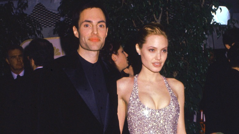 James Haven attending the Golden Globes with sister Angelina Jolie