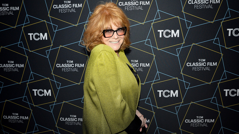 Ann-Margret smiling over her shoulder