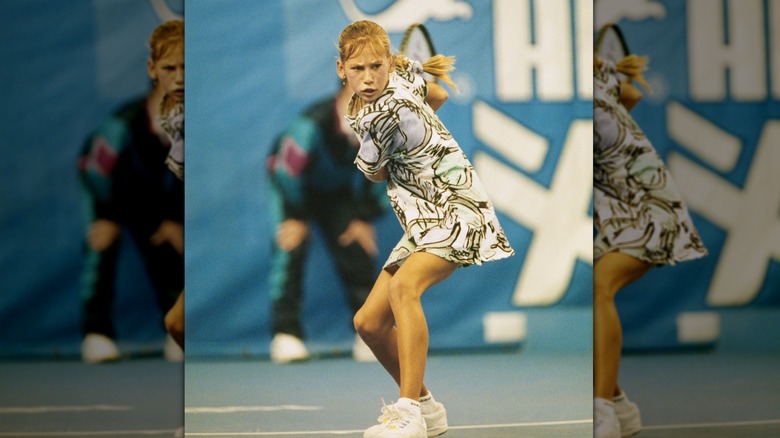 Young Anna Kournikova playing tennis