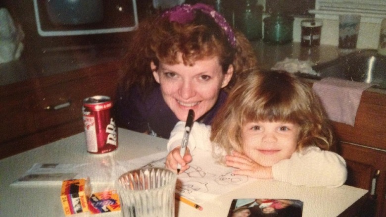 Young AnnaLynne McCord smiling with her mother 