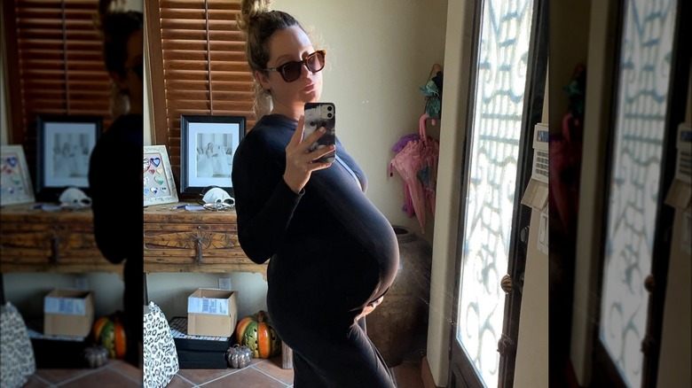 Ashley Tisdale with her baby bump