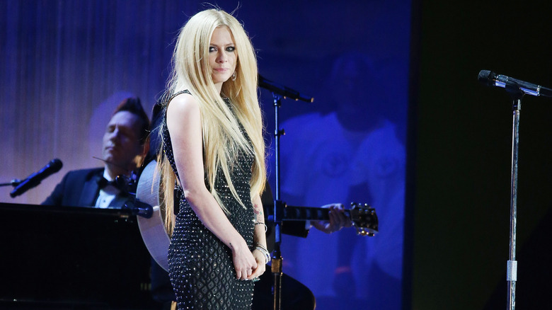 Avril Lavigne looking glamorous onstage