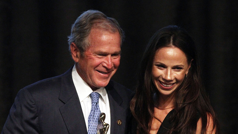 Barbara Bush laughing with her dad George W. Bush