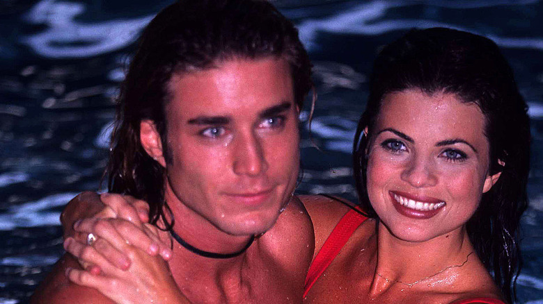 Yasmine Bleeth smiling in swimming pool